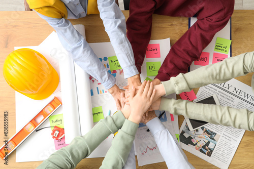 Business people putting han...