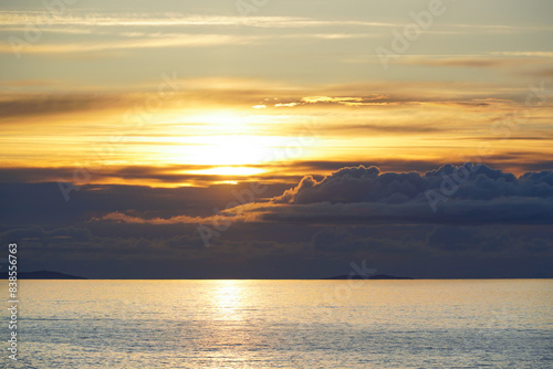 Sunset on a beach on the isle of Iona. Iona is a small island of the Inner Hebrides in the west of Scotland. 