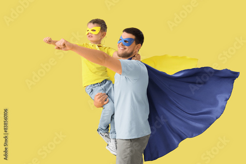 Little boy with his father ...