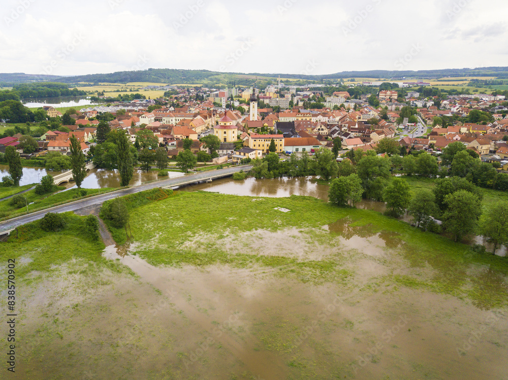 Flood in the countryside near the town Dobrany, West Bohemia, Czech republic, European union. Aerial view of flooded Radbuza river and landscape.