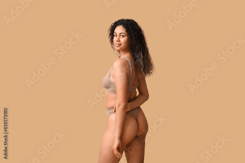 Confident young woman with ...