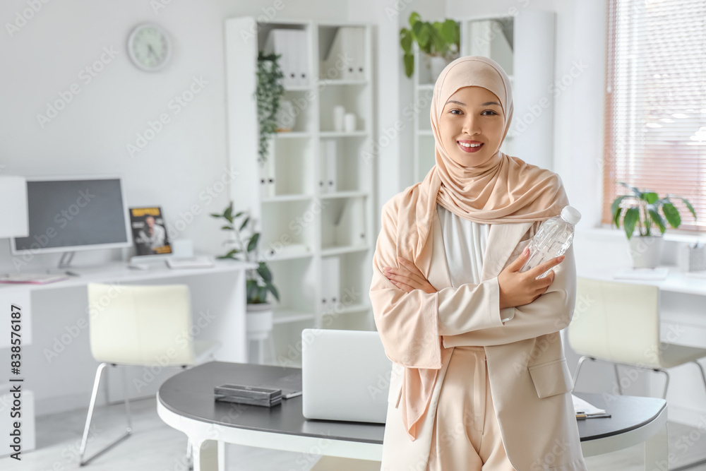 Portrait of young Muslim businesswoman in office Portrait of young Muslim businesswoman in office