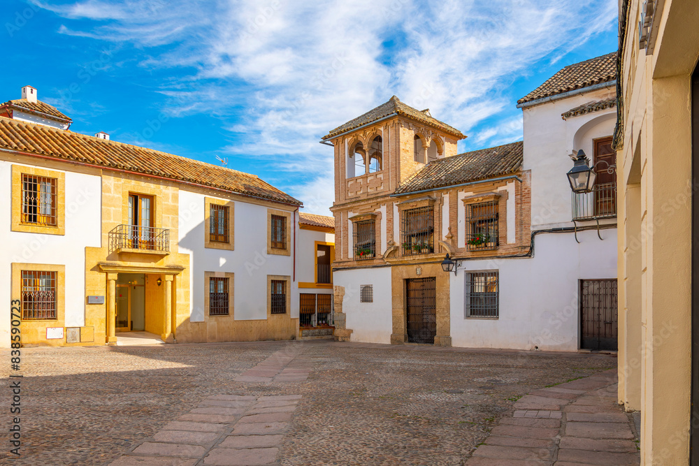 The historic Plaza de Maimónides, or Maimonides Square, in the center of the Jewish Quarter in the Andalusian city of Córdoba, Spain. The historic Plaza de Maimónides, or Maimonides Square, in the center of the Jewish Quarter in the Andalusian city of Córdoba, Spain.