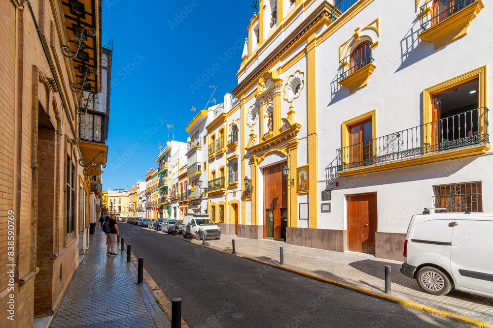 Naklejka premium The Capilla de los Marineros, or Chapel of the Sailors, in the colorful and busy Triana District neighborhood of the Andalusian city of Seville, Spain.