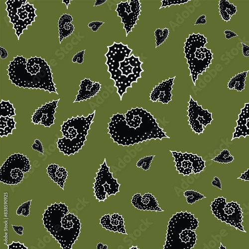 seamless repeat pattern with simple and cute black spiky leaves on a green background perfect for fabric, scrap booking, wallpaper, gift wrap projects