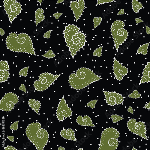 seamless repeat pattern with simple and cute green spiky leaves on a black background with dots perfect for fabric, scrap booking, wallpaper, gift wrap projects