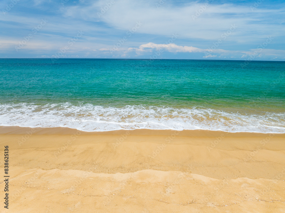 Aerial view of sea crashing waves White foaming waves on beach sand, Top view beach seascape view Nature sea ocean background Aerial view of sea crashing waves White foaming waves on beach sand, Top view beach seascape view Nature sea ocean background