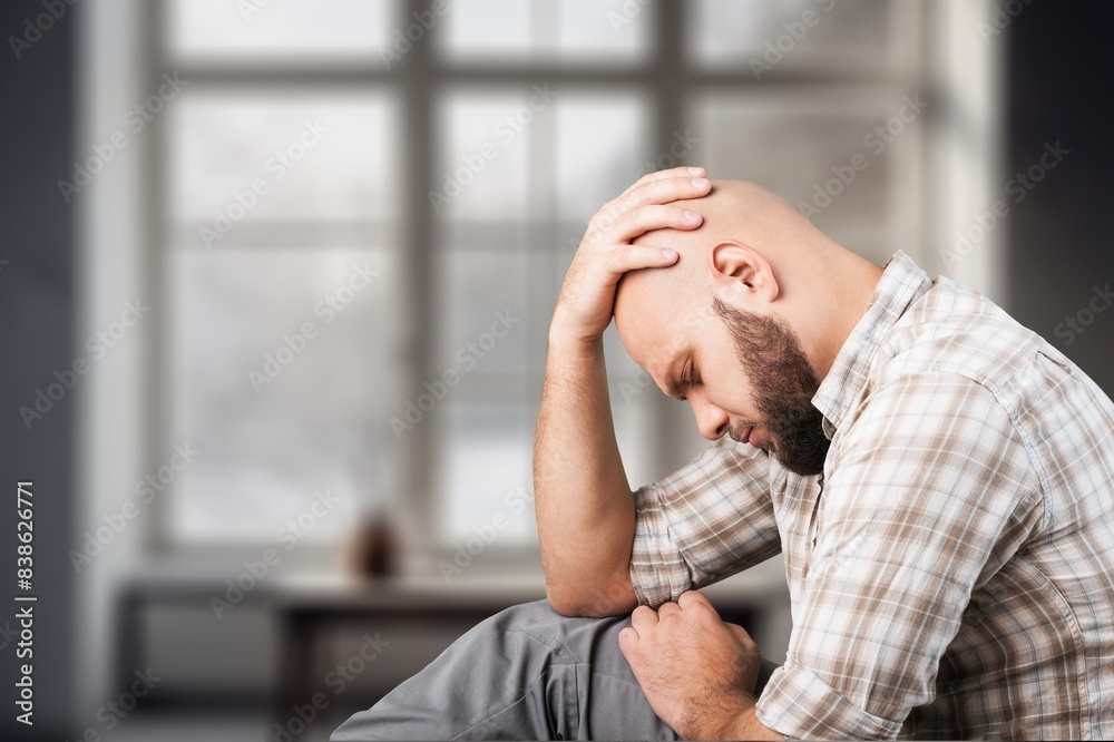 Depression, crisis, breakdown sad man at home Depression, crisis, breakdown sad man at home