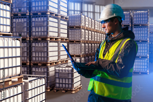 Man inspector in warehouse ...