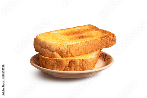 Plate with toasted bread isolated on white background.