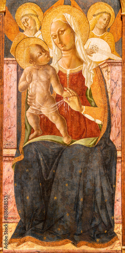 ASSISI, ITALY - MAY 17, 2024: The medieval painting of Madonna in Cathedral San Rufino by Matteo da Gualdo (1435 - 1507). photo