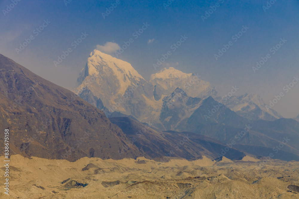 Himalaya mountains landscape with high altitude snow and ice glacier summit peaks. Everest Base Camp Solo Khumbu trekking region in Nepal. Beautiful Himalayas eight thouthander summits under blue sky Himalaya mountains landscape with high altitude snow and ice glacier summit peaks. Everest Base Camp Solo Khumbu trekking region in Nepal. Beautiful Himalayas eight thouthander summits under blue sky