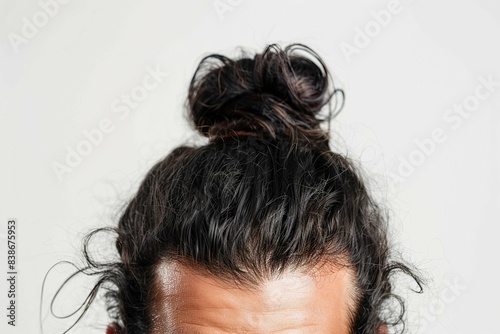 Close up view on man bun hairstyle