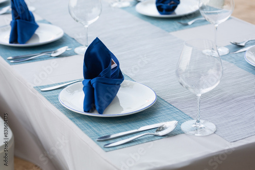 Setting tables and arranging dishes in a hotel or restaurant