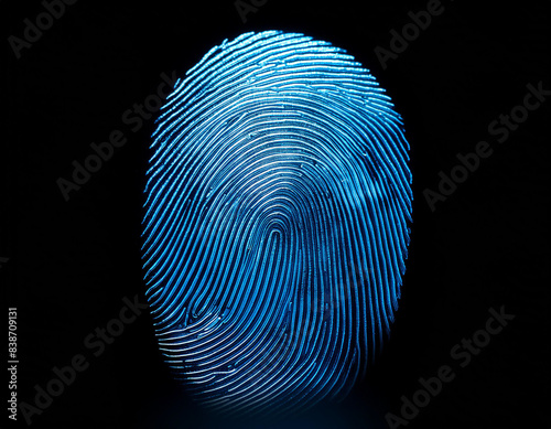Translucent fingerprint against a black background