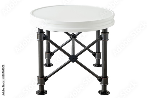 A round table with a white top and black legs photo