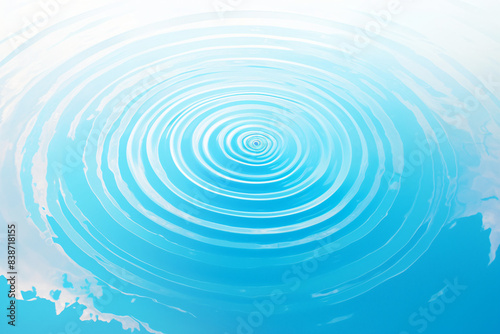 Water ripples on a light blue background