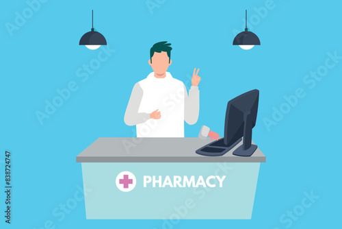 The boy is standing at reception desk in pharmacy.