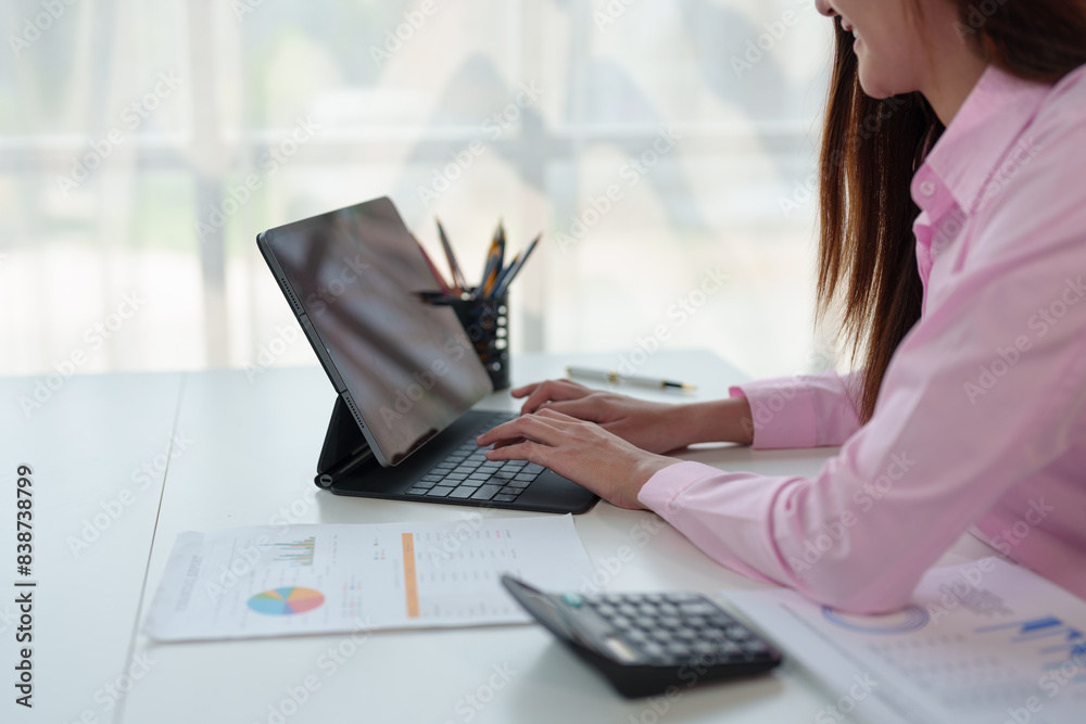 Businesswoman working in real estate project with presenting new project ideas, analyzing marketing and investment plans in modern office.