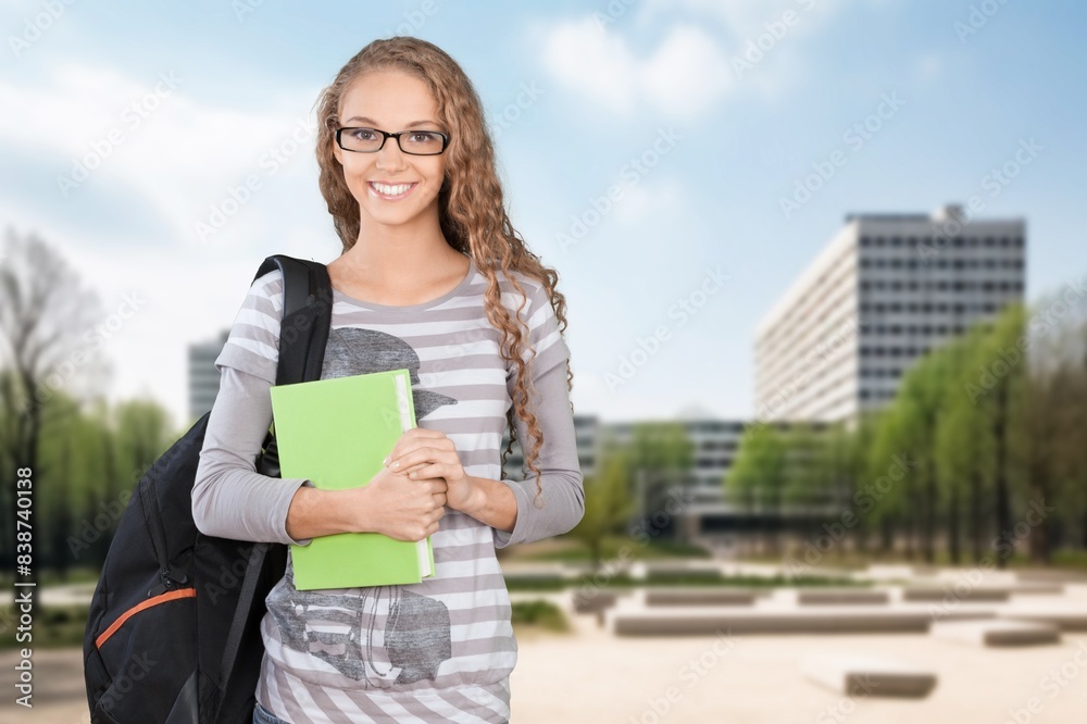 Young woman ready to study in university. Young woman ready to study in university.