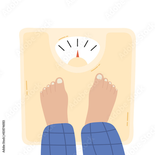 Person is standing on bathroom scales over