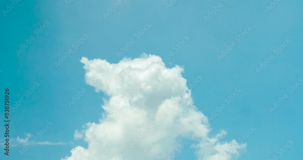 Timelapse Blue sky fluffy white clouds on summer season bright clear skyline with beautiful cloudscape. Timelapse Panorama blue sky clouds heaven on daylight with copy space. Cloudscape sunny day. Timelapse Blue sky fluffy white clouds on summer season bright clear skyline with beautiful cloudscape. Timelapse Panorama blue sky clouds heaven on daylight with copy space. Cloudscape sunny day.