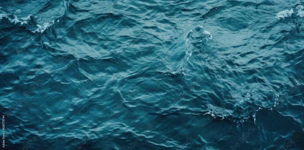 texture of water in the ocean a rocky shoreline with a small island in the distance, surrounded by a vast expanse of water texture of water in the ocean a rocky shoreline with a small island in the distance, surrounded by a vast expanse of water