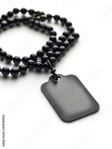 Black beaded necklace with tag photo