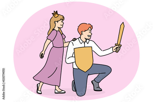 Princess girl near father with knight sword spend time together playing royal family from fairy tales. Hero protect princess from enemies saving little daughter for fatherhood concept
