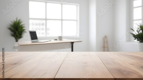 empty wooden desk with blurred business office