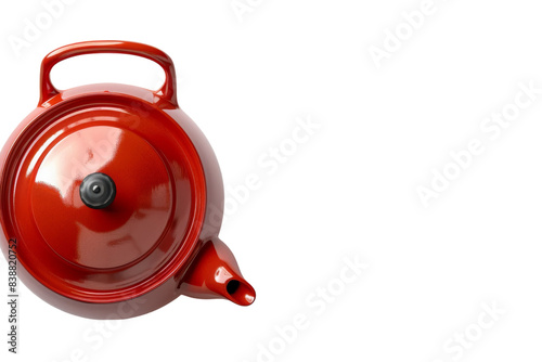 Top View of a Red Ceramic Teapot With a Black Knob
