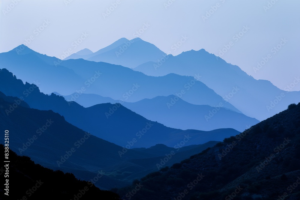 Naklejka premium Snow-Covered Mountain Range at Twilight