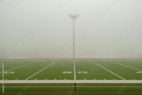 50 Yard Line View of American Football Field with Fog