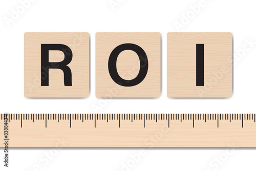 Return on investment concept. ROI text on wooden cubes, measuring ruler isolated on white background. Performance measure of business efficiency, target and goals