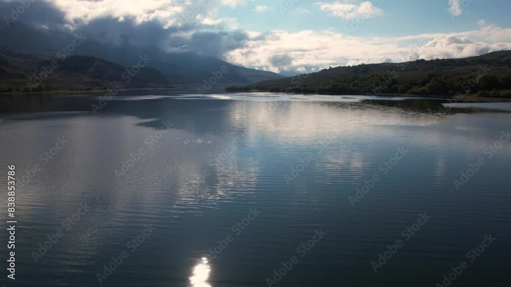Aerial View of Beautiful Alpine Lake and Mountains, Clouds and Sky Reflection on Water Surface Aerial View of Beautiful Alpine Lake and Mountains, Clouds and Sky Reflection on Water Surface