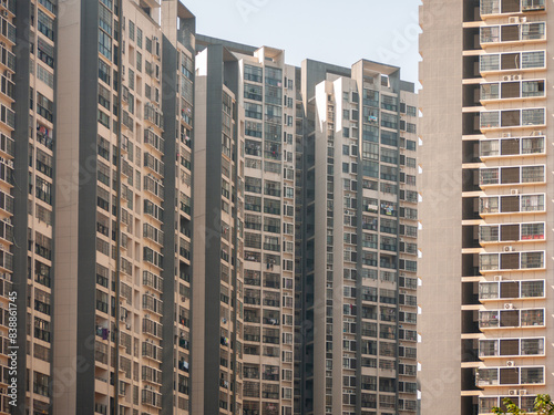 High-density  high-rise modern residential apartment buildings in the city of Liuzhou  China. Towering  modern blocks packed closely with countless windows. Concept of urban living  home ownership