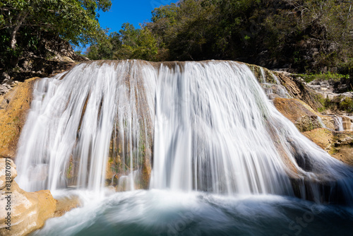 Scenic view of the waterfall in Air Terjun Tanggedu, Sumba Island, Indonesia photo