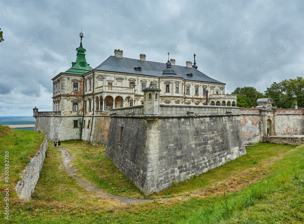 Pidhirtsi Castle, a true architectural gem, stands proudly amidst the Ukrainian countryside. Pidhirtsi Castle, a true architectural gem, stands proudly amidst the Ukrainian countryside.