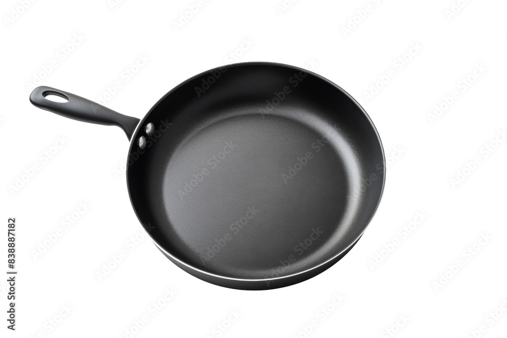 The Elegant Dance of the Black Frying Pan on a White or Clear Surface PNG Transparent Background. The Elegant Dance of the Black Frying Pan on a White or Clear Surface PNG Transparent Background.