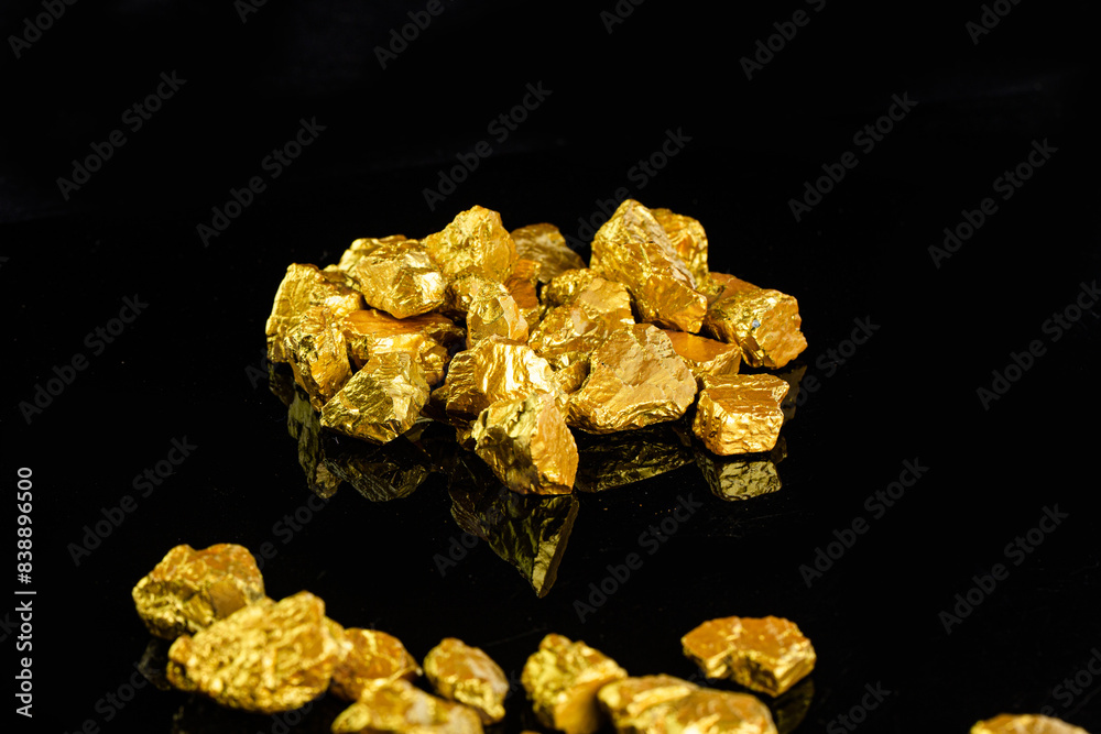 Closeup of big gold nugget finance concept Closeup of big gold nugget finance concept