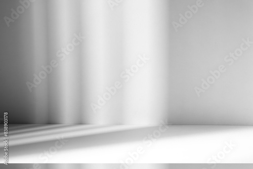 Wall interior background, studio and backdrops show products.with shadow from window color white and grey. background for text insertion and presentation product