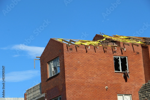 Durban, KwaZulu Natal, South Africa - June 4 2024: Tornado damage to houses in Desainager and Seatides on KwaZulu Natal north coast photo