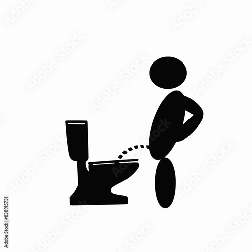 Man standing and peeing on the toilet bowl isolated on white background