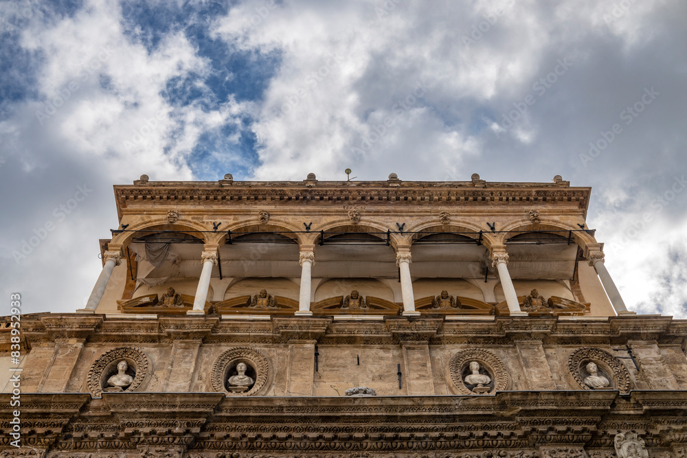 Fototapeta premium PALERMO, ITALY, JUNE 15, 2023 - View of the Porta Nuova (New Gate) in the historic center of Palermo, Italy