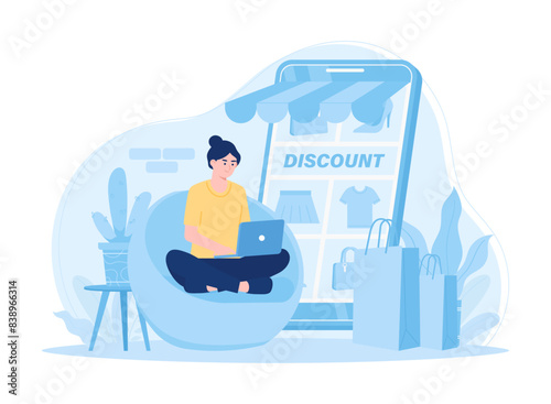 Girl sitting with laptop shopping online via smartphone concept flat illustration © Kinn Studio