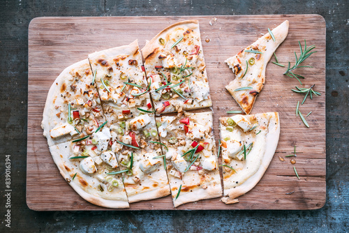 Tarte Flambee with apple, goat cheese, spring onions, rosmary and walnuts photo