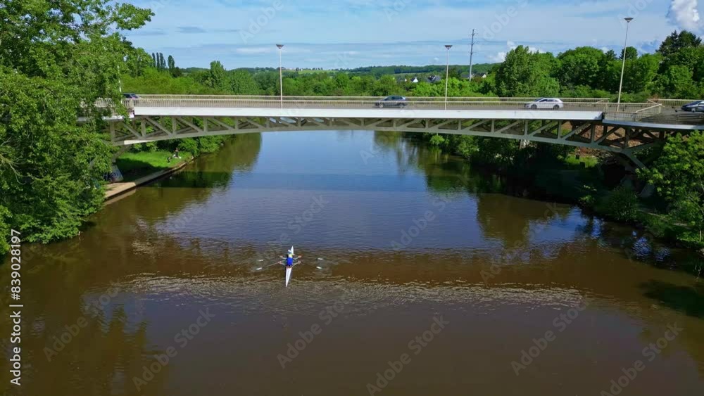 Pont de Pritz bridge over Mayenne River, border between Laval and Changé, France. Aerial drone forward ascending Pont de Pritz bridge over Mayenne River, border between Laval and Changé, France. Aerial drone forward ascending