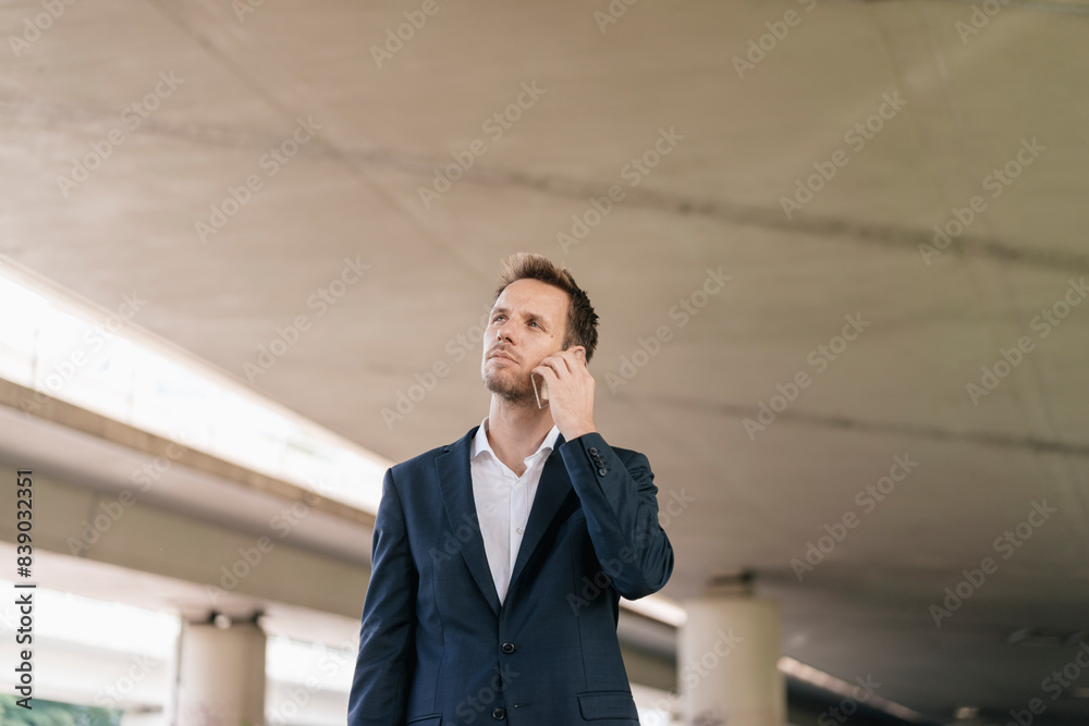 Businessman using futuristic smartphone Businessman using futuristic smartphone