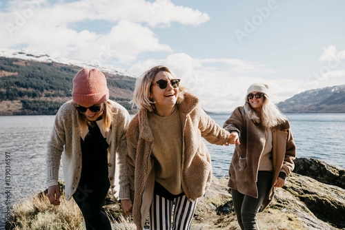 UK, Scotland, happy female friends at Loch Lomond