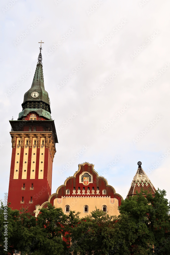 The upper facade and clock tower of the city hall, town hall of Subotica, an example of Art Nouveau architecture in the city center, Subotica, Serbia